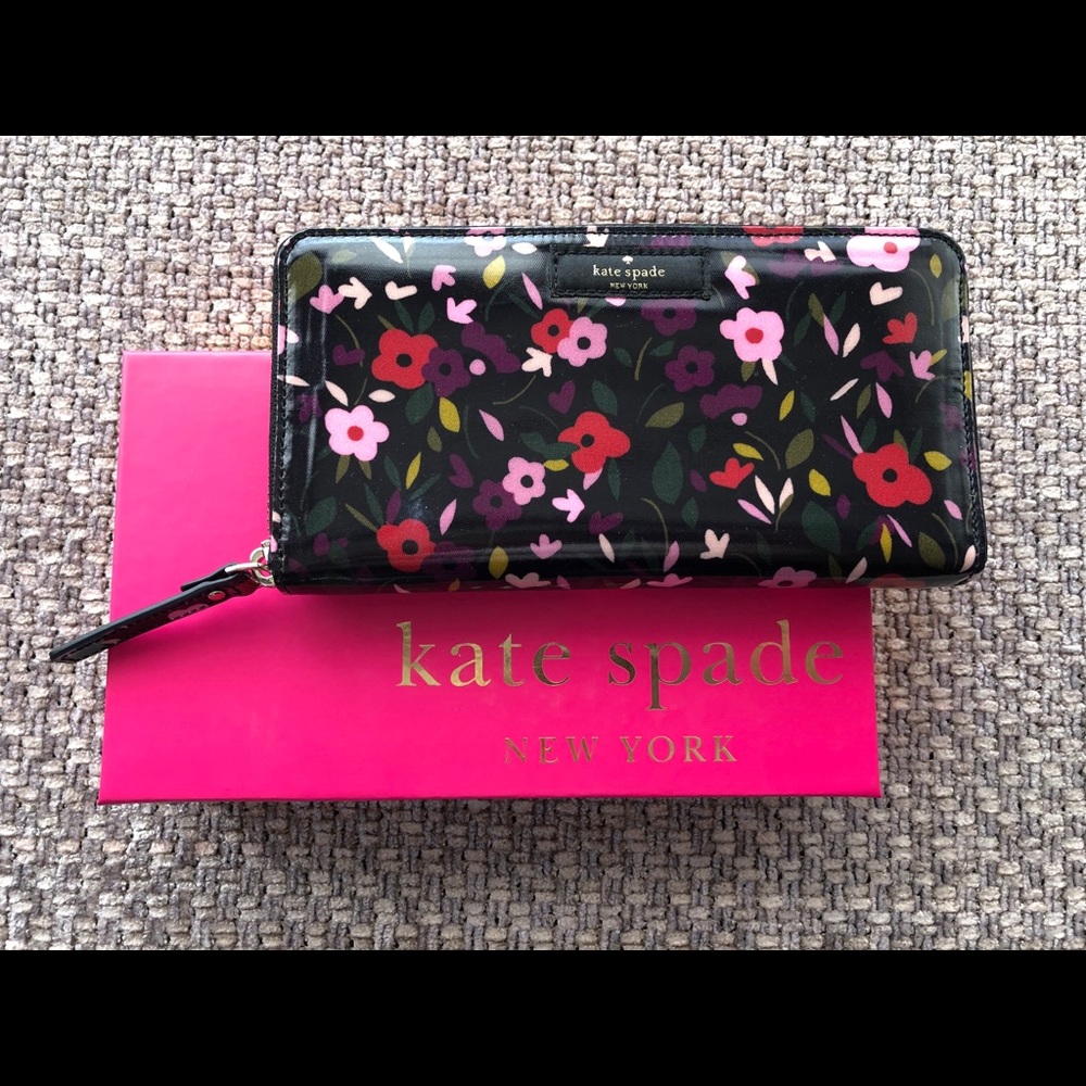 Kate Spade “Daycation Boho Floral” Wallet